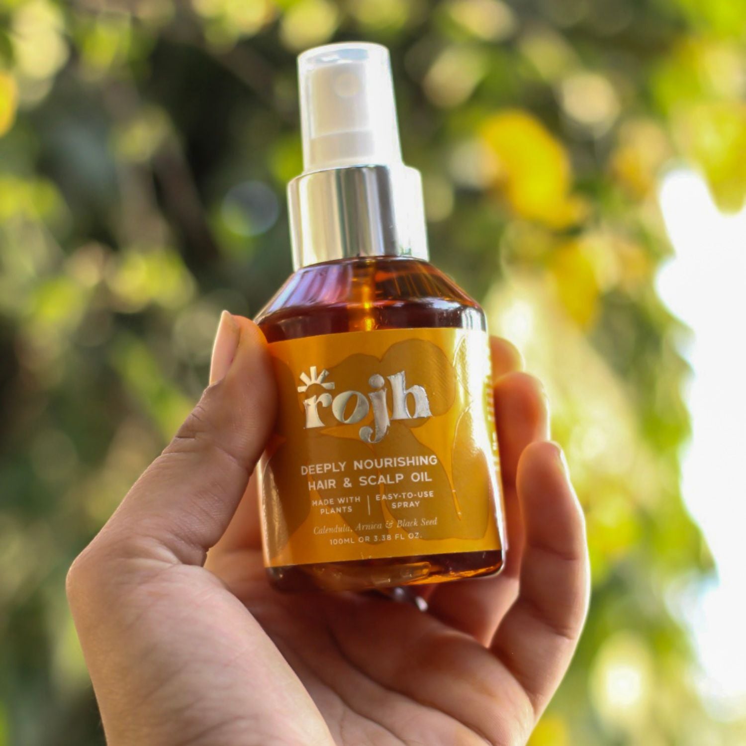 Rojh Hair Oil in Hand